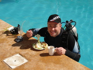 Mark E having lunch on the go...